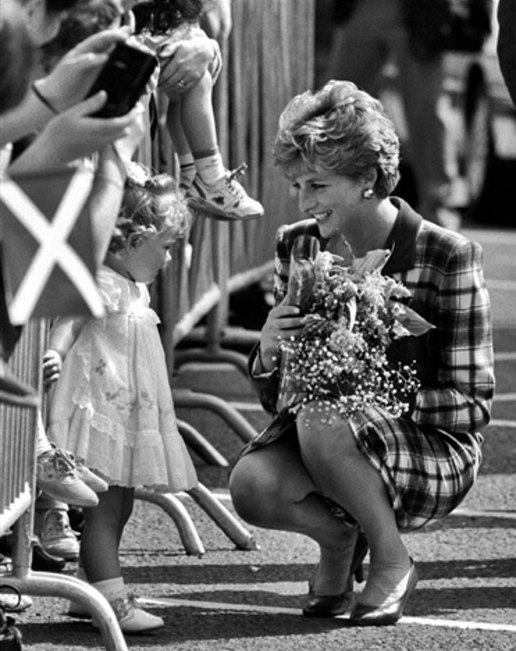 Harry Benson, Princess Diana with Little Girl, 1992
Archival Pigment Print, 24 x 30 in.