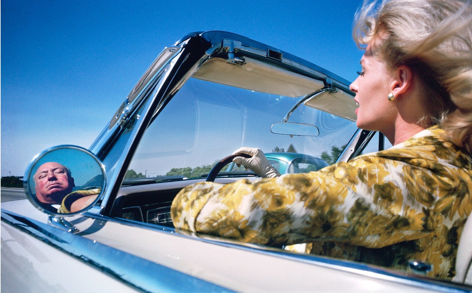 Lawrence Schiller, Tippi Hedren drives with Alfred Hitchcock, 1962
Dye Sublimation, 30 x 48 in.